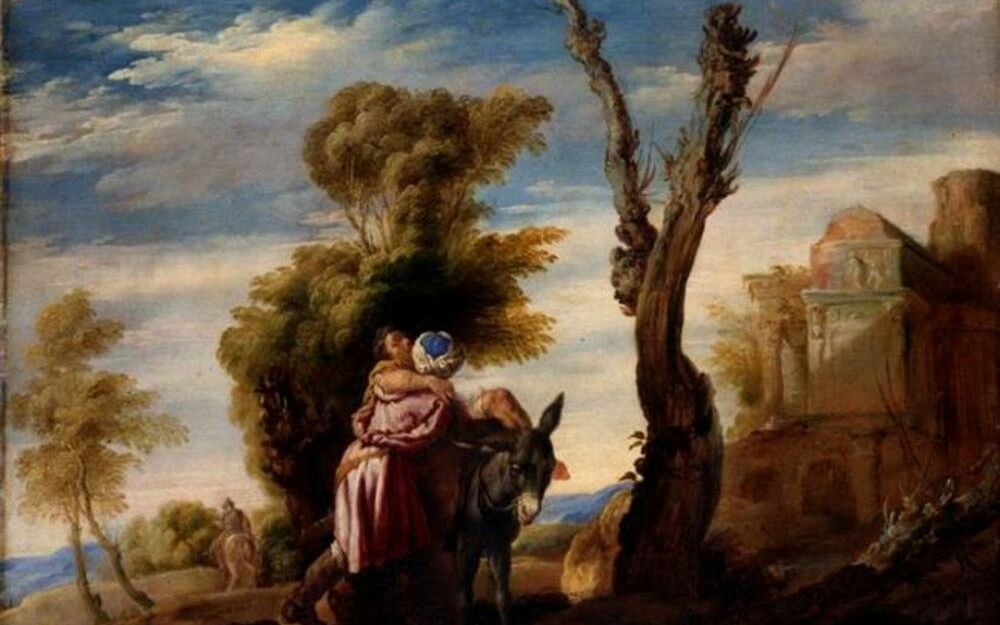 Een man wordt van een ezel getild.