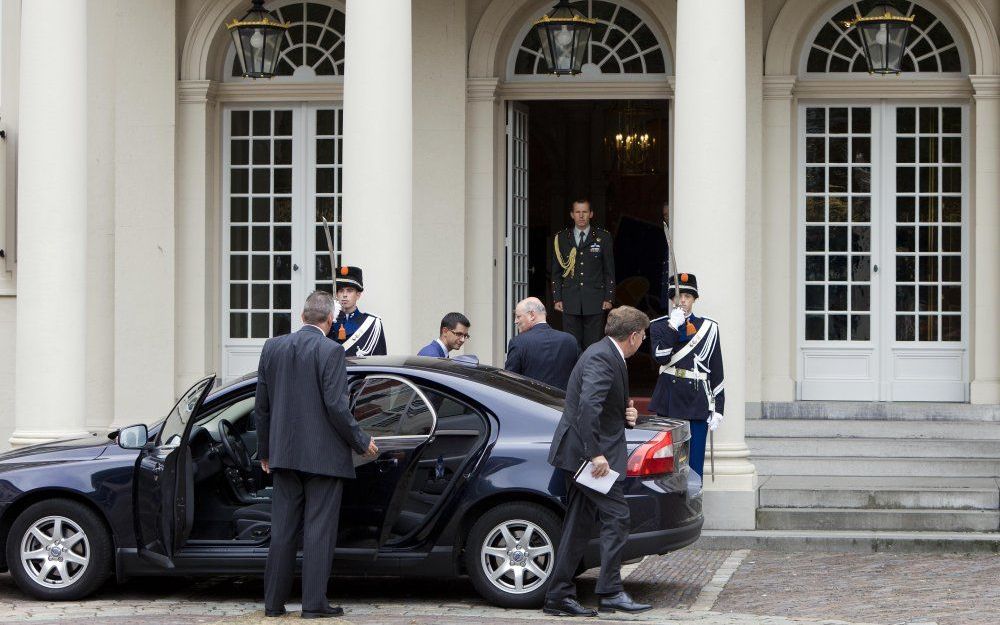 Wallage en Rosenthal komen aan bij de Koningin. Foto ANP