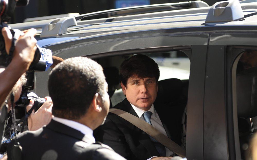 Blagojevich verlaat de rechtbank. Foto EPA