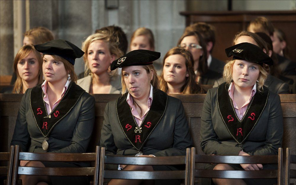 UTRECHT - Medewerkers van de Utrechtse Universiteit wonen maandag in de Domkerk in Utrecht de opening van het Academisch jaar bij. Foto ANP