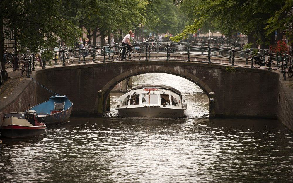 Burgemeester Eberhard van der Laan schetst woensdag in de gemeenteraad van Amsterdam de jaarlijkse Staat van de stad, waarin hij toelicht hoe de hoofdstad ervoor staat. Foto ANP