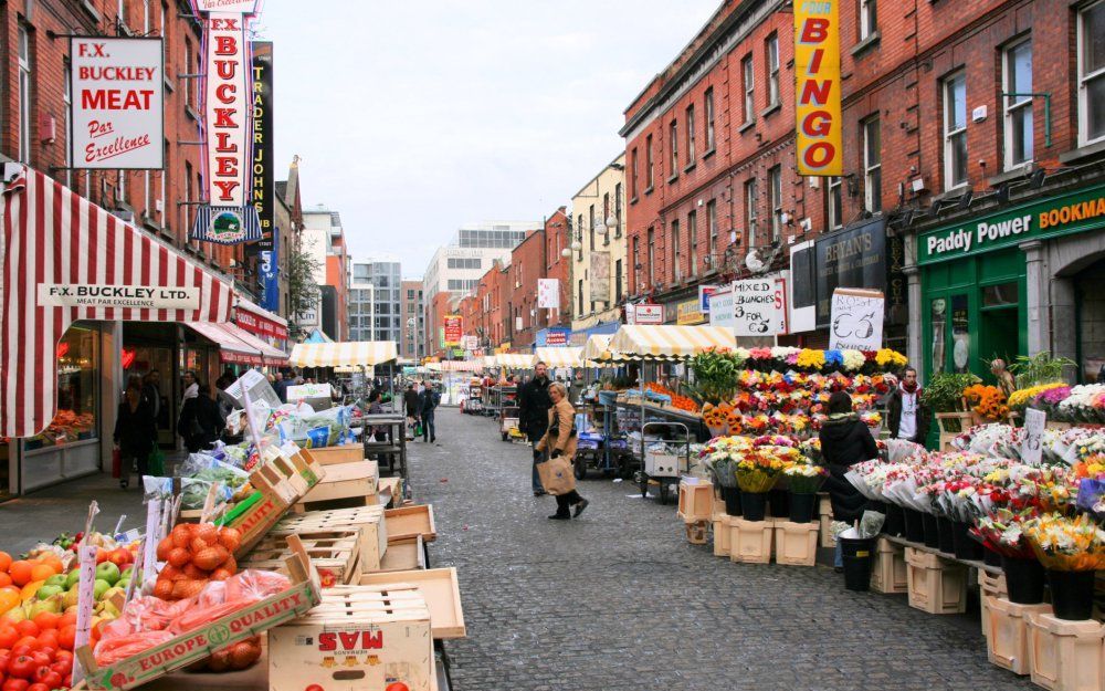 Markt in Moorestreet in de Ierse hoofdstad Dublin. De jaren van rijkdom en onbeperkt consumeren en uitgeven zijn voor de meeste Ieren voorbij. Foto Wikimedia