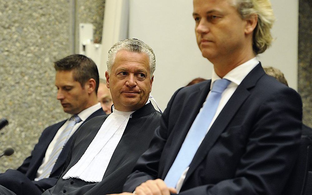 Wilders (r.) en zijn advocaat Moszkowicz. Foto ANP