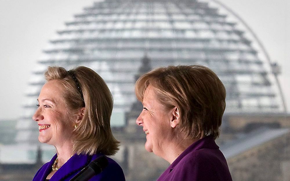 Clinton en Merkel in Berlijn. Foto EPA