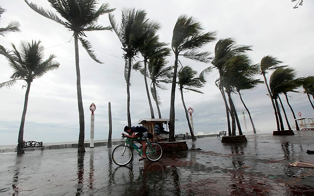 Het dodental als gevolg van de tropische storm is opgelopen tot dertien.  Foto EPA