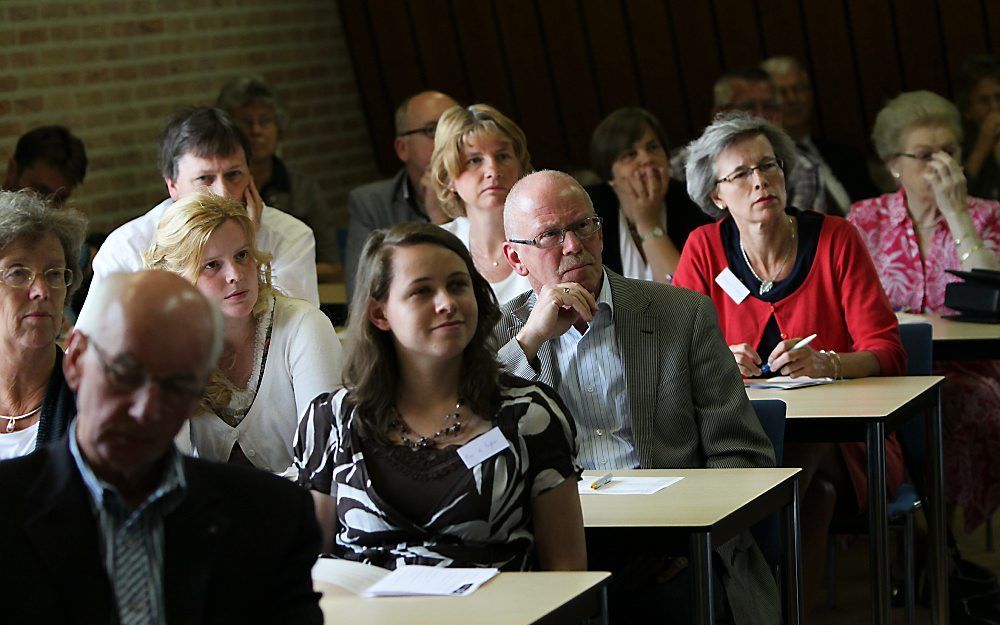 Aandacht tijdens drukbezochte open dag Theologische Universiteit Apeldoorn. Foto VidiPhoto