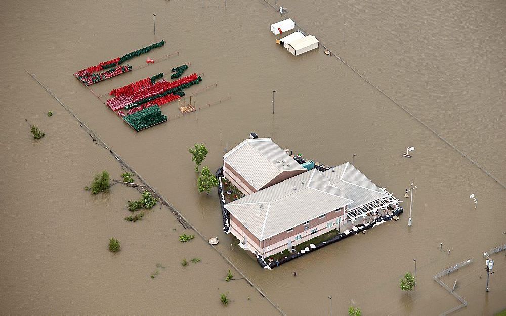 Een ondergelopen bedrijf in de buurt van Waterproof, Louisiana. Foto EPA