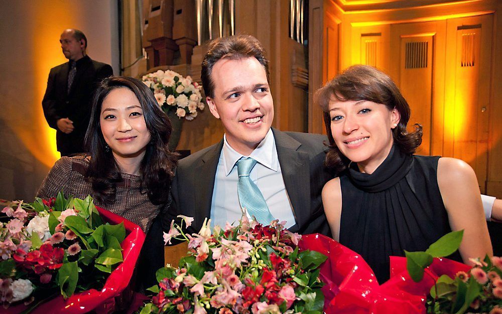 De eerste drie prijswinnaars van de Koningin Elisabethwedstrijd. V.l.n.r.: de Koraanse sopraan Haeran Hong, de Belgische tenor Thomas Blondelle en de Russische sopraan Elena Galitskaya. Foto EPA