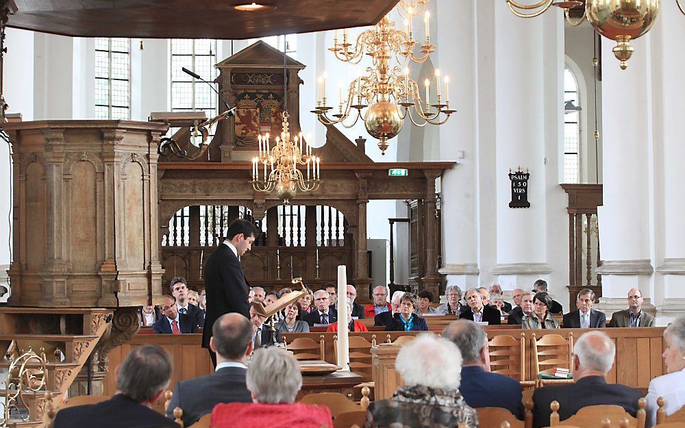 Dr. A. Goudriaan (Vrije Universiteit) sprak zaterdag in Vianen op een conferentie van de Stichting Vrienden van dr. H. F. Kohlbrugge over Augustinus en de val van Rome. Foto William Hoogteyling