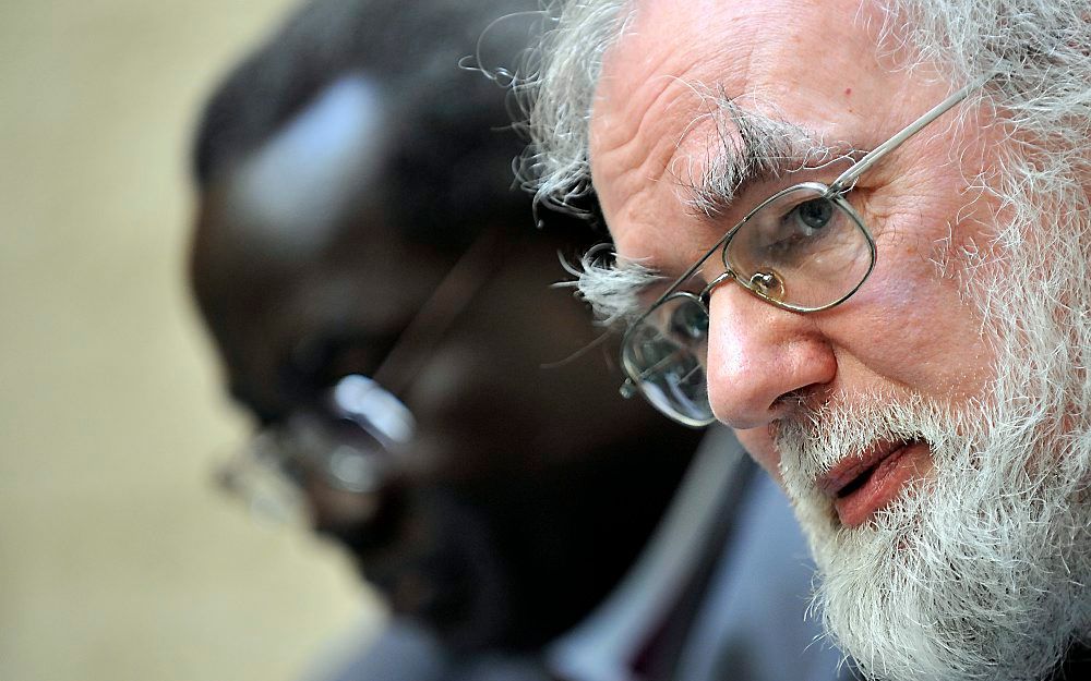 LONDEN - De Anglicaanse leider Rowan Williams waarschuwt dat de positie van christenen in het Midden-Oosten onder druk komt te staan. Foto EPA