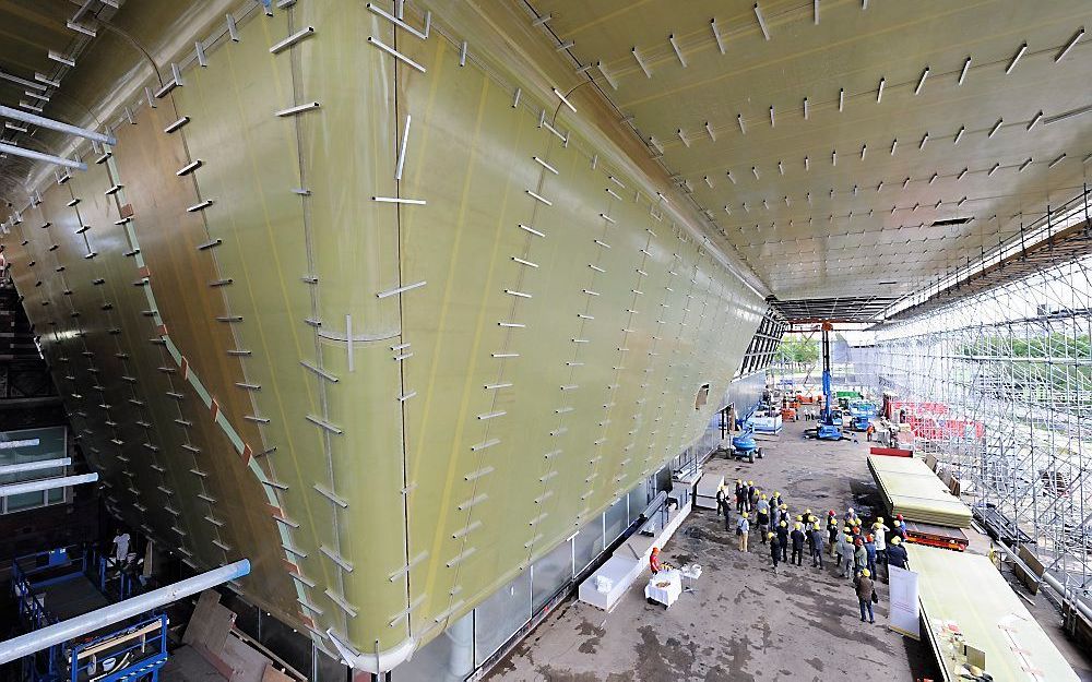 Het nieuwbouwgedeelte van het Stedelijk Museum in Amsterdam, de zogeheten ‘badkuip’, begint vorm te krijgen. Foto ANP