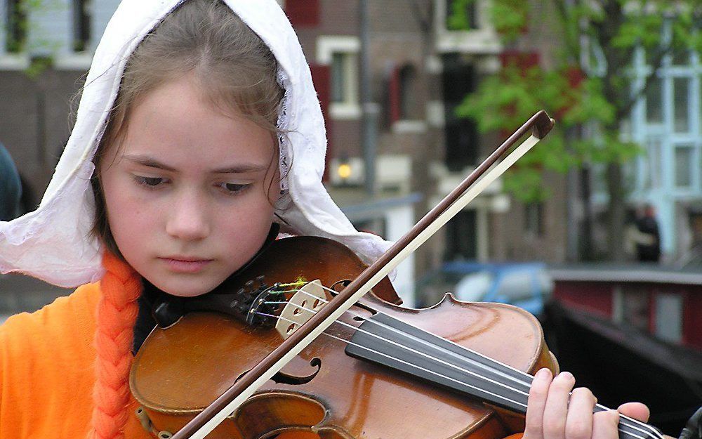 Onderzoekers van de VU proberen deze weken uit te zoeken waarom kinderen melancholische muziek mooi vinden. Foto Kees Hoogeveen.