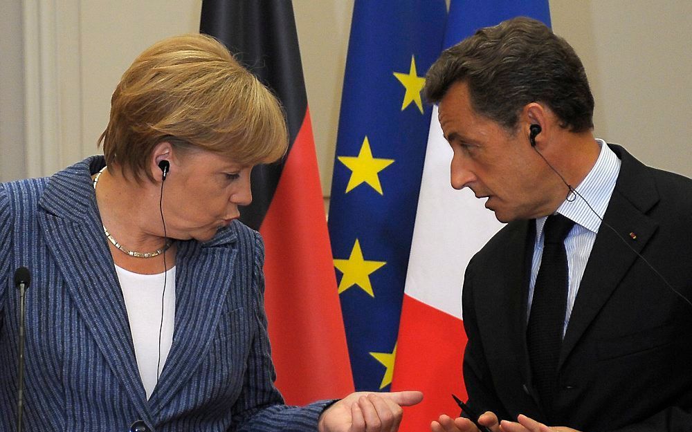 Merkel en Sarkozy. Foto EPA