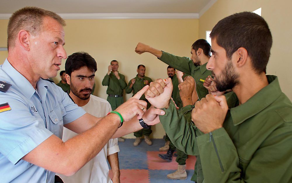 Afghaanse agenten krijgen training van Duitse politietrainers in een trainingscentrum in Kunduz. Foto ANP