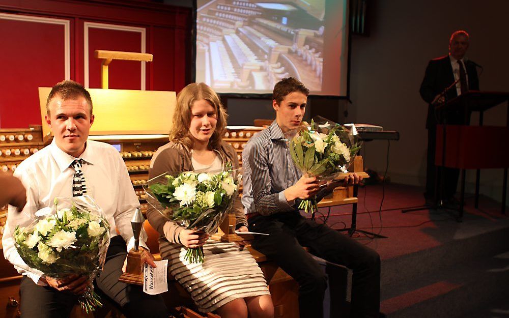 De prijswinnaars van het Feike Asma Concours. V.l.n.r.: Peter Biemond, Annemarie van Woudenberg en Kees van den Brink. Foto Johannus Orgelbouw