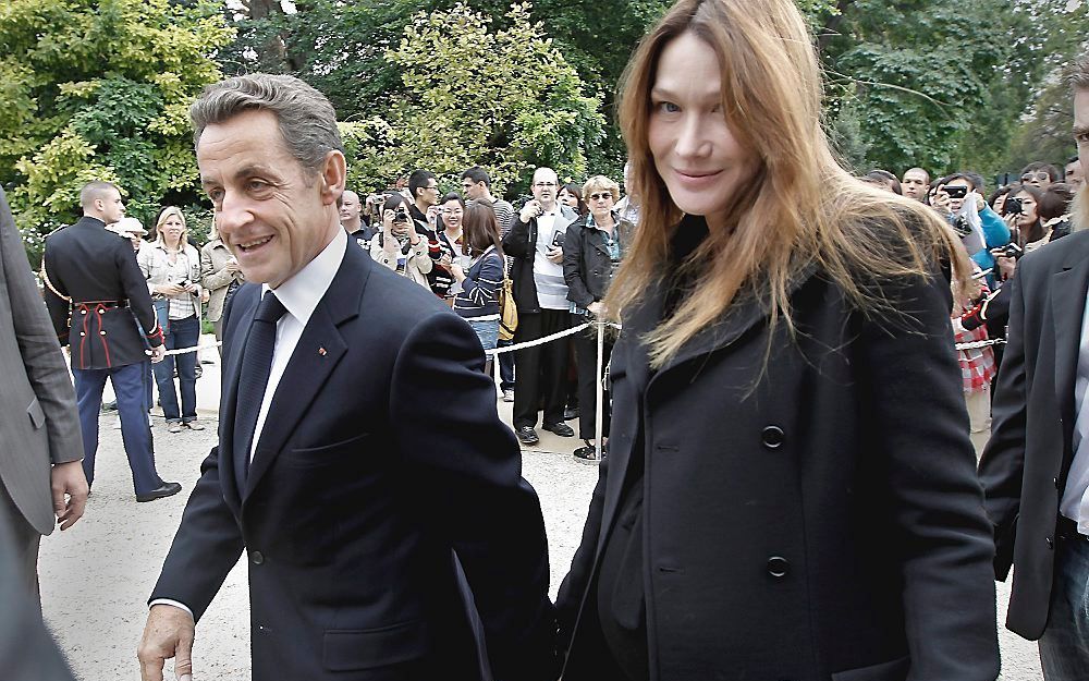 De Franse president Nicolas Sarkozy met zijn vrouw, Carla Bruni-Sarkozy. Foto EPA