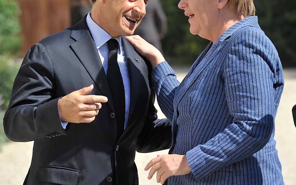 Merkel en Sarkozy. Foto EPA