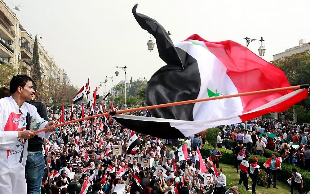 Pro-Assad demonstranten in Damascus. Foto EPA