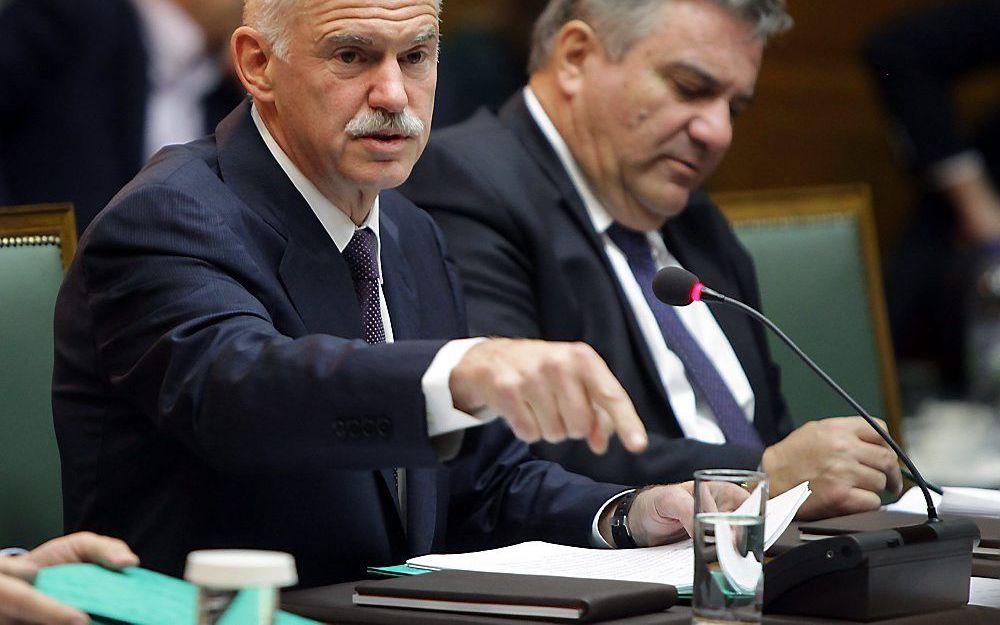 Papandreou donderdagmiddag in het Griekse parlement. Foto EPA