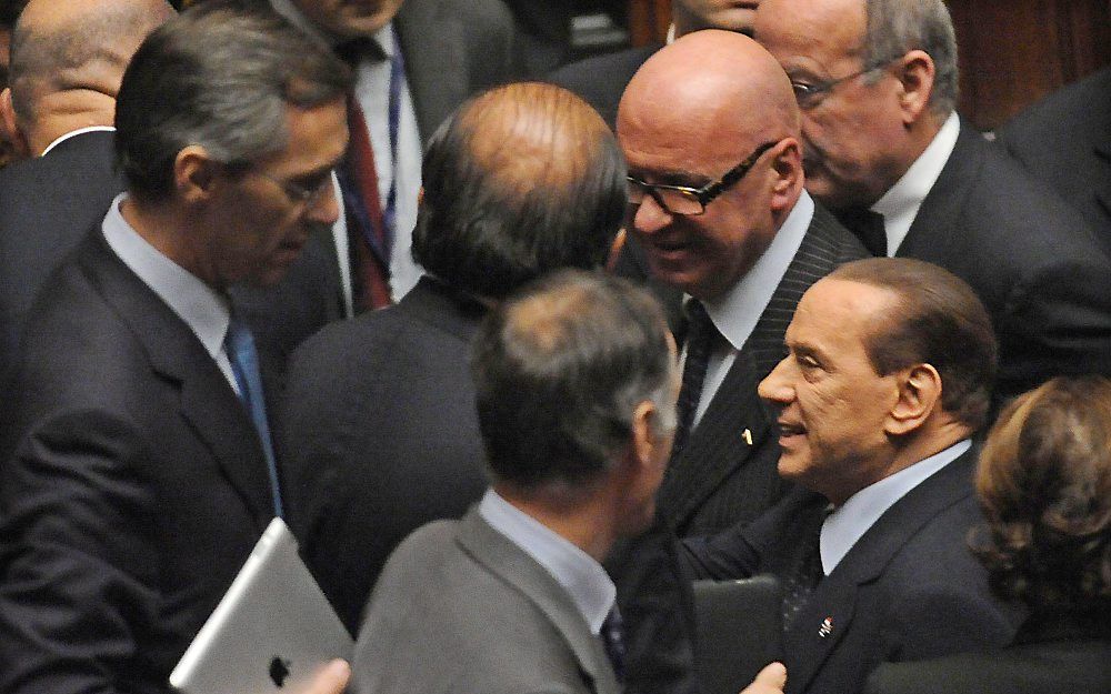 Het kabinet-Berlusconi is zaterdagavond bijeen gekomen voor haar laatste zitting.  Foto EPA