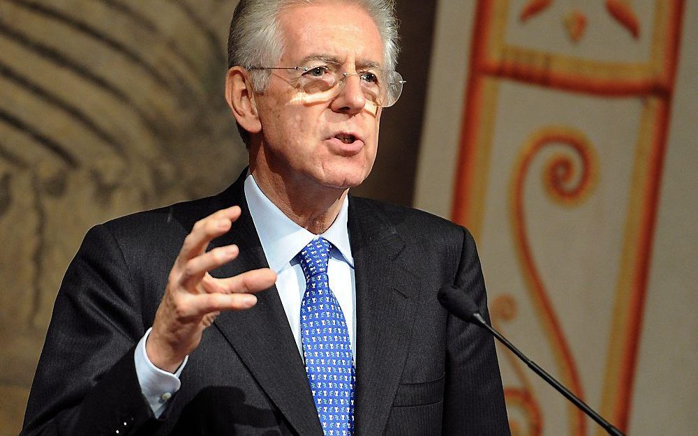 De gedoodverfde nieuwe premier van Italië, Mario Monti, gisteren tijdens een persconferentie.	Foto EPA