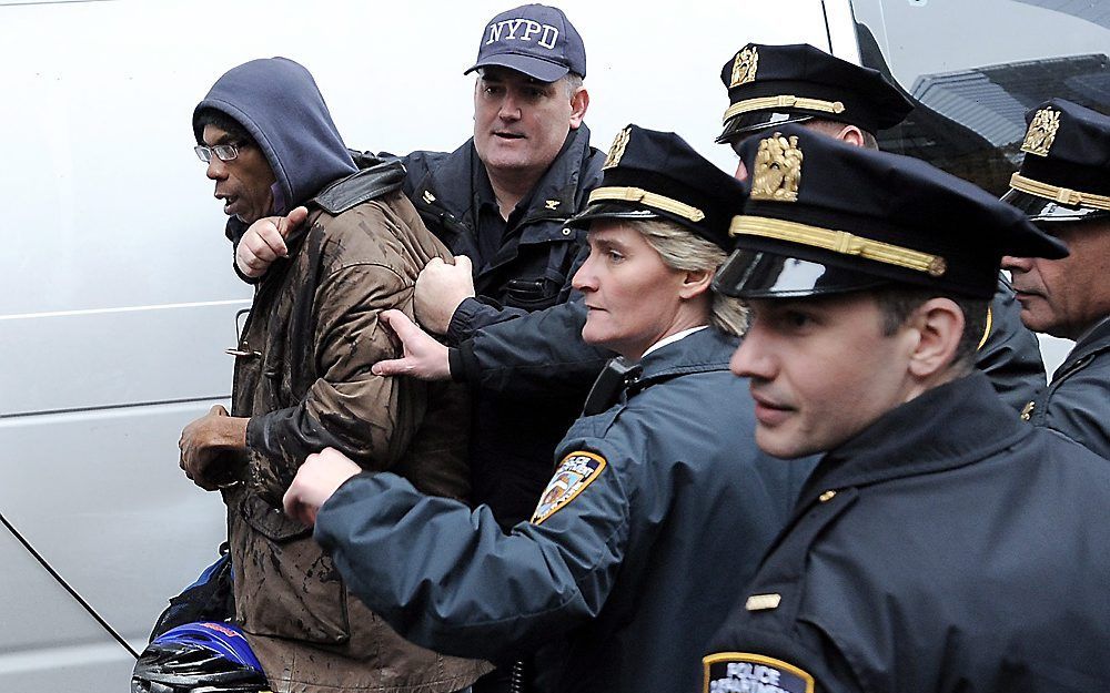 De politie van New York arresteert donderdag een demonstrant van de Occupy-beweging. Foto EPA