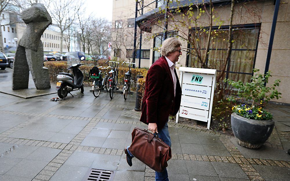 Henk van der Kolk, voorzitter van FNV Bondgenoten, arriveert voor aanvang van de federatieraad in Amsterdam. Foto ANP