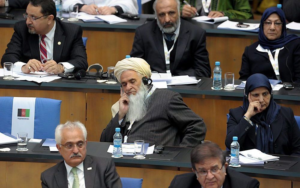 Een Afghaanse delegatie tijdens de top in Bonn. Foto EPA