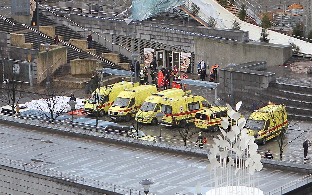 Op de Place Saint-Lambert in Luik heeft een man een aantal granaten gegooid naar een bushalte. Foto EPA