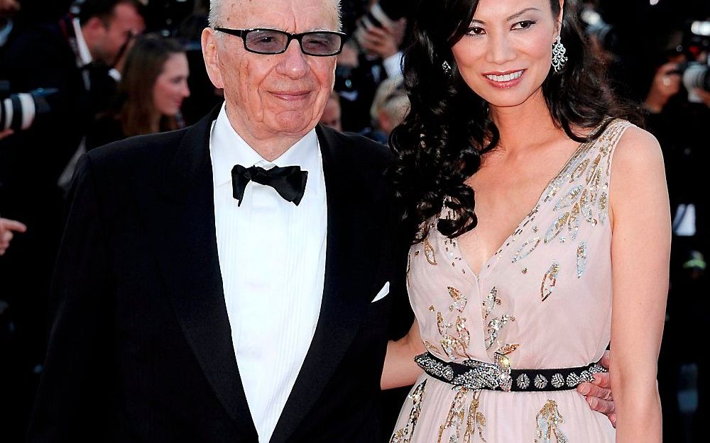 Murdoch en zijn vrouw Wendi Deng. Foto EPA