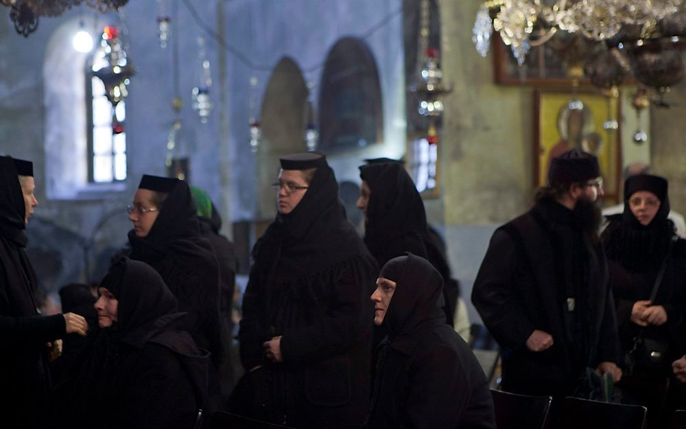 Een processie van orthodoxe geestelijken, vrijdag in Bethlehem. Foto EPA