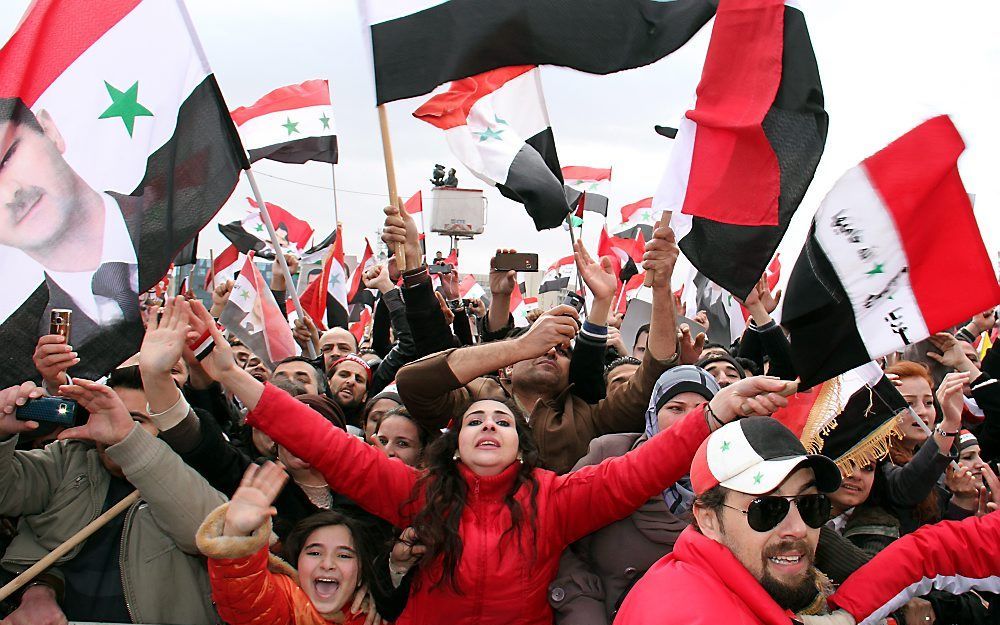 Pro-Assadbijeenkomst in Damascus. Foto EPA