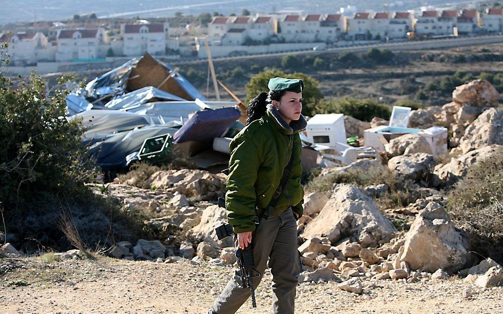 Israëlische grenssoldaat op de Westoever.  Foto EPA