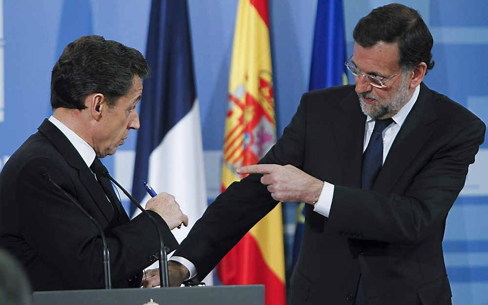 Persconferentie maandagmiddag van de Spaanse premier Mariano Rajoy en de Franse president Nicolas Sarkozy. Foto EPA