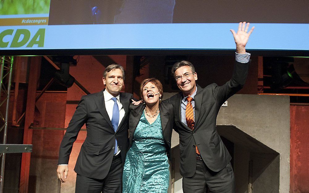 Peetoom, Van Haersma Buma (l.) en Verhagen na het slotwoord op het CDA-congres in Utrecht. Foto ANP