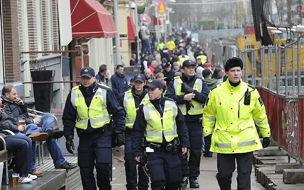 Politie in de Amsterdamse binnenstad.  Foto ANP