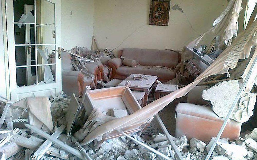 Verwoest huis in Homs. Foto EPA