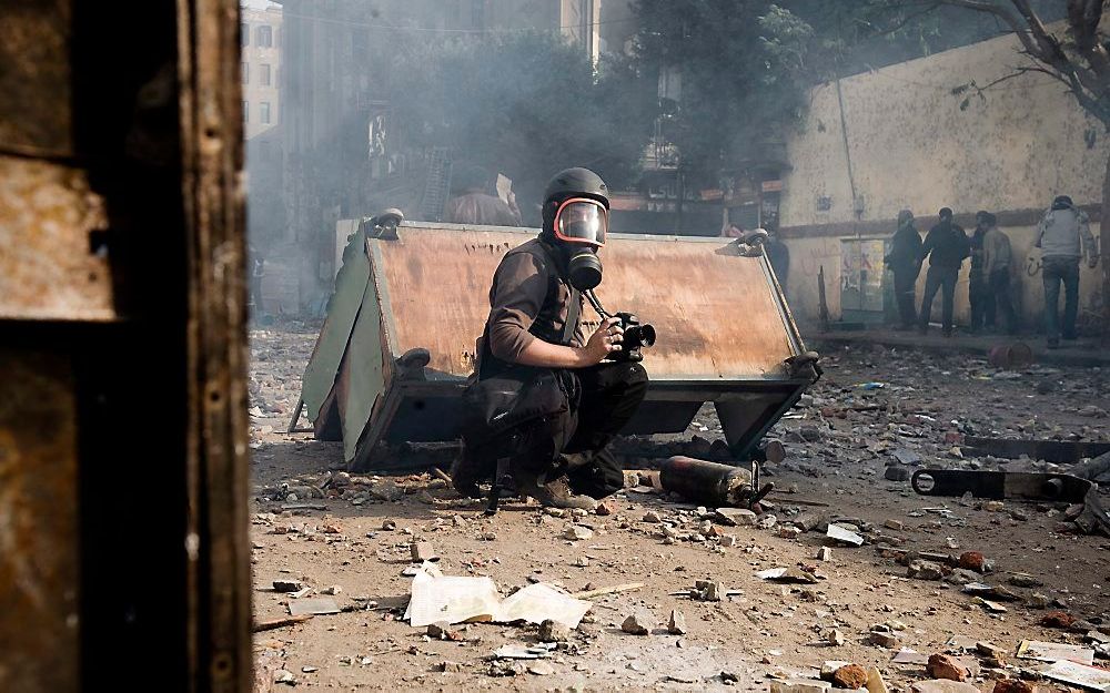 Remi Ochlik aan het werk. Foto EPA