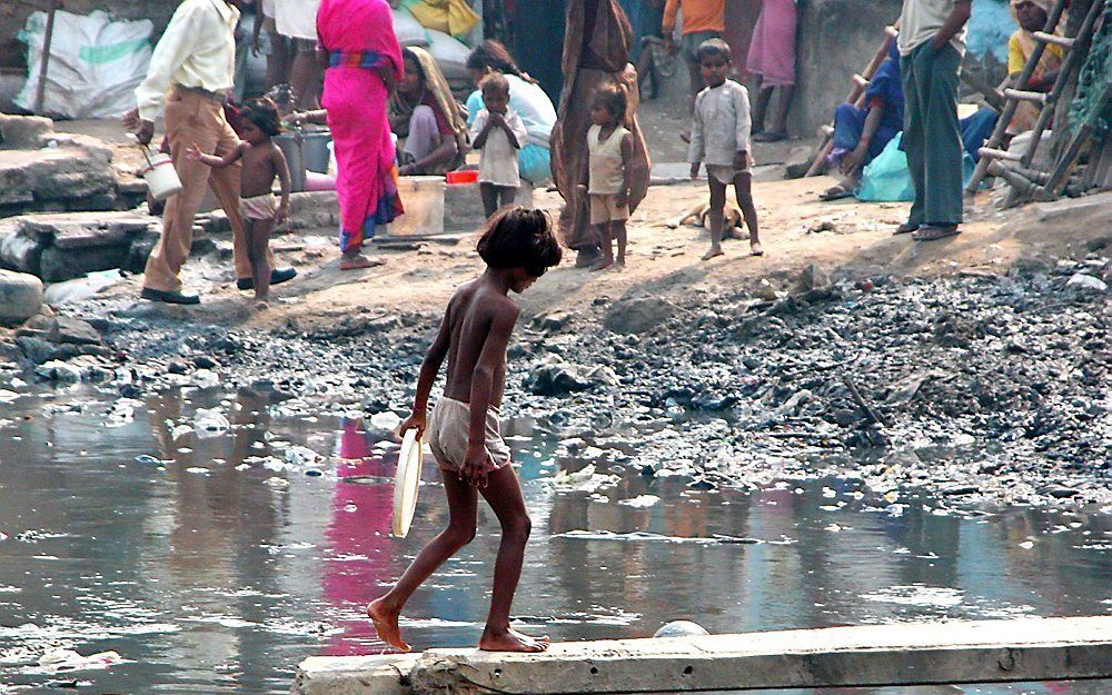 Een sloppenwijk in India. Foto EPA