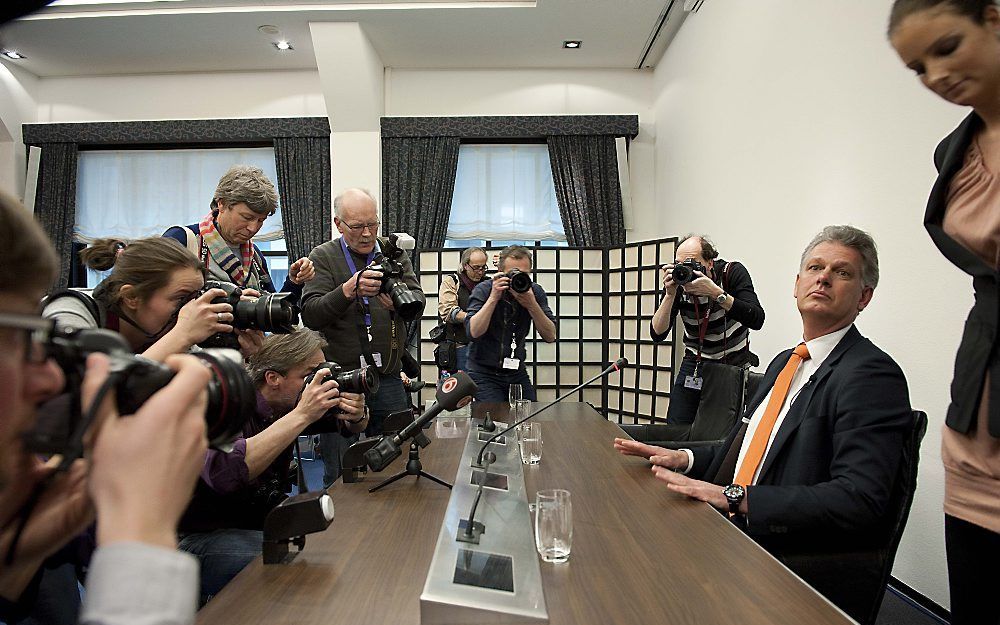 Brinkman tijdens de persconferentie. Foto ANP