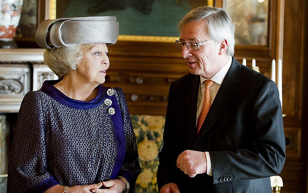 Koningin Beatrix en minister-president Juncker.  Foto ANP