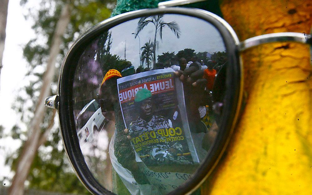 Demonstranten in Abidjan, Ivoorkust, protesteren tegen coup in Mali. Foto EPA