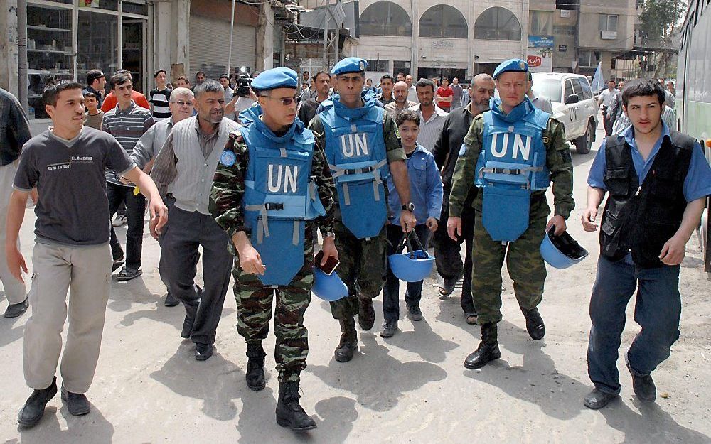 Waarnemers in Damascus. Foto EPA