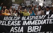 Pakistaanse christenen protesteerden eind vorig jaar voor vrijlating van de christin Asia Bibi, die wegens godslastering ter dood is veroordeeld. Foto EPA