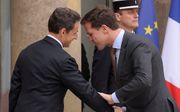 Sarkozy en Rutte tijdens top Parijs. Foto EPA