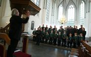 Dirigent Pieter Jan Leusink tijdens een concert van het Holland Boys Choir in de Oude Kerk in Ede. Foto RD, Anton Dommerholt