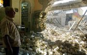 KIRKUK - De ravage na de bomaanslag op een kerk in Kirkuk. Foto EPA