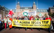 Protest tegen handelsverdrag TTIP in Amsterdam vorig jaar. beeld ANP