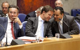 Minister Verhagen (l.), Premier Rutte (m.) en Minister De Jager (r.) tijdens de algemene beschouwingen in de Tweede Kamer. Foto ANP