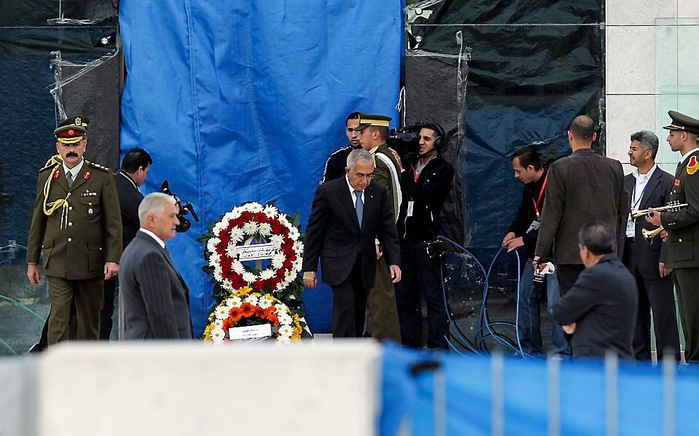 Ceremonie rondom de opgraving bij het mausoleum van Yasser Arafat  Foto EPA